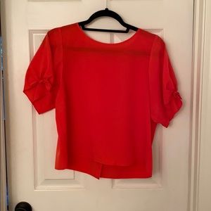 1. State silk blouse in orange